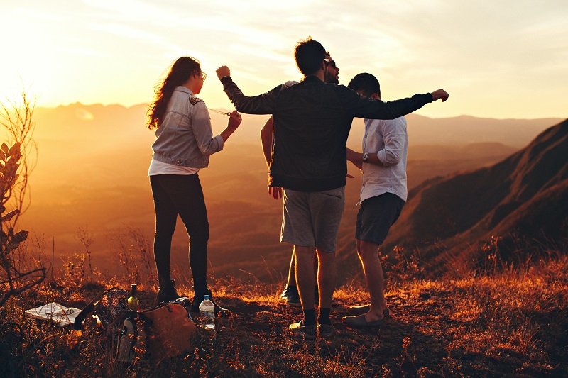 How do I use CBD Group of Friends Walking on a Hill During a Sunset