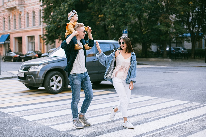 How do I use CBD Couple Walking in a Crosswalk with a Child on the Man's Shoulders