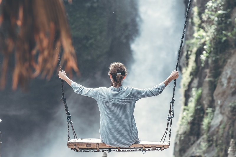 How do I use CBD Woman on a Swing in Front of a Waterfall