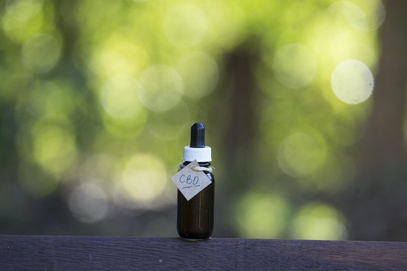 How Long will CBD Tinctures Last in the Bottle CBD Bottle Sitting Outside on a Bench