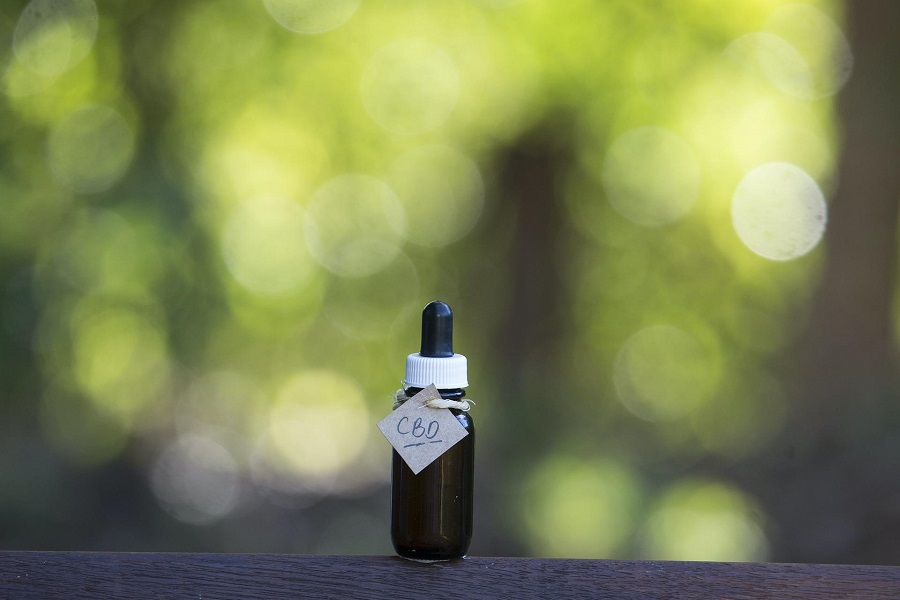 Why PlantMD CBD is the Best Value Close Up of a Small Bottle with a Tag That Says CBD
