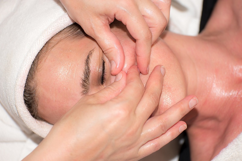 Are CBD Topicals Good for Your Skin Close Up of Someone Getting a Face Massage