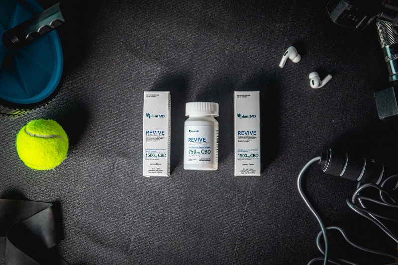 How Long do CBD Effects Last Overhead of PlantMD Products Lying on the Floor with Sports Equipment Surrounding Them