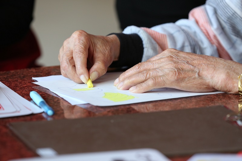 How CBD Helps with Joint Pain Close Up of an Elderly Person Coloring